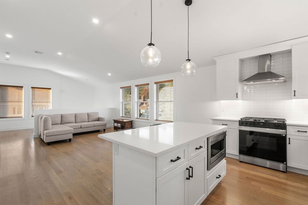 Interior, Kitchen, Pendant Lights, Recessed Lighting, Stainless Steel Appliances, Wood Texture Flooring