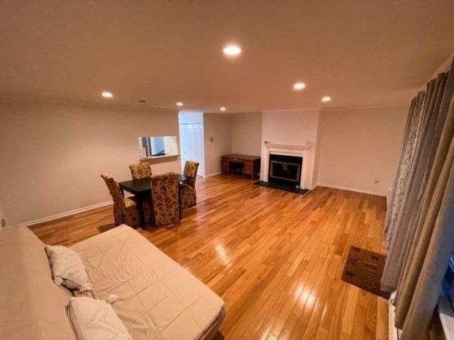 Bedroom, Dining room, Fireplace, Interior, Recessed Lighting, Wood Texture Flooring