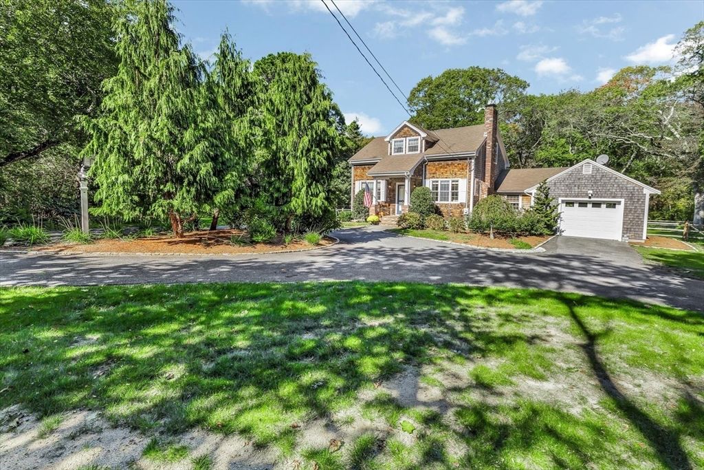 Attached, Backyard, Exterior, Facade, Brick Facade, Cape Cod