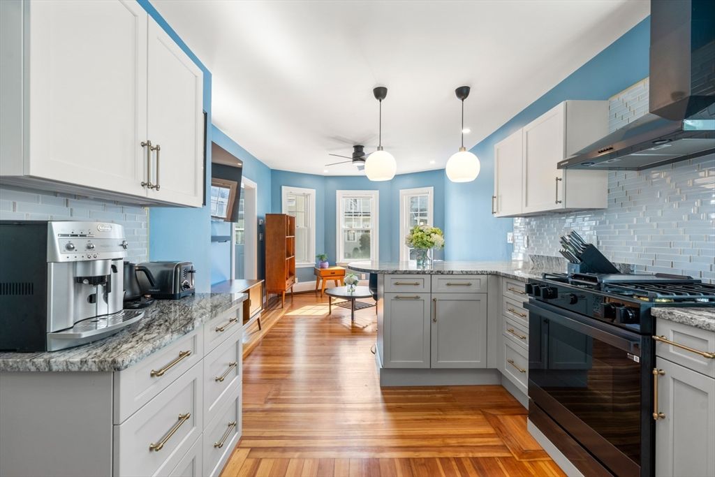 Dining room, Interior, Kitchen, Pendant Lights, Stainless Steel Appliances, Wood Texture Flooring