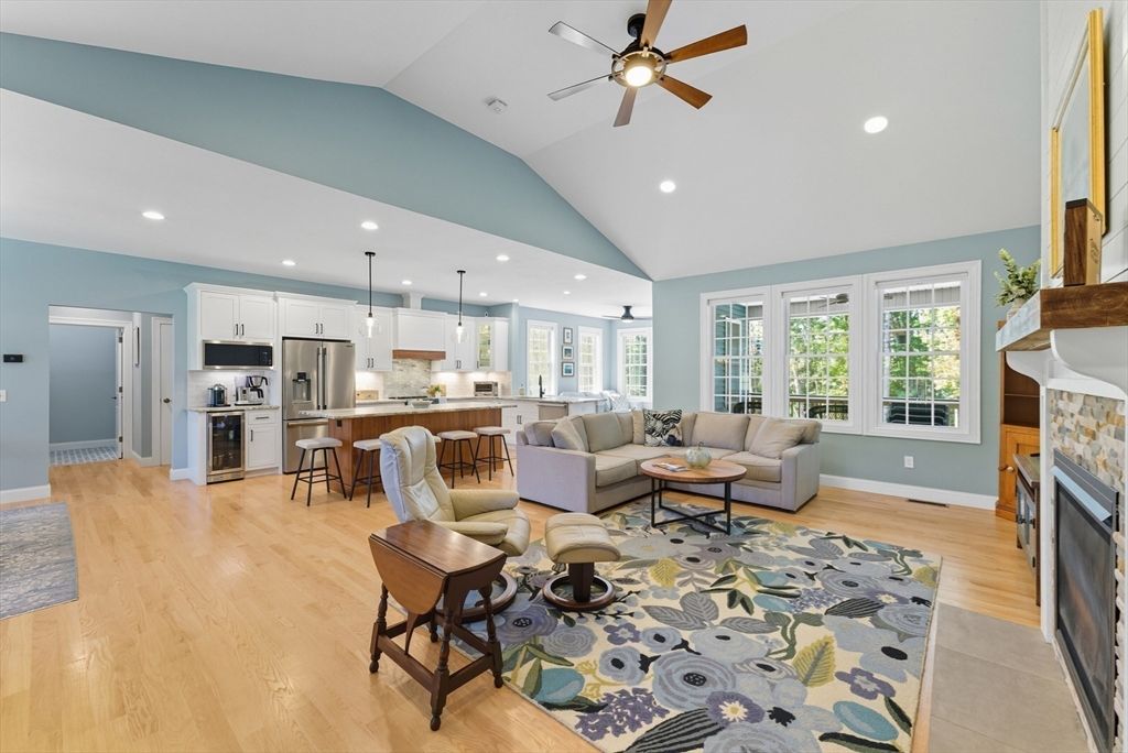 Fireplace, Interior, Kitchen, Living room, Pendant Lights, Recessed Lighting, Stainless Steel Appliances, Wood Texture Flooring