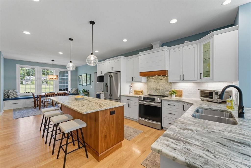 Dining room, Interior, Kitchen, Pendant Lights, Recessed Lighting, Stainless Steel Appliances, Wood Texture Flooring