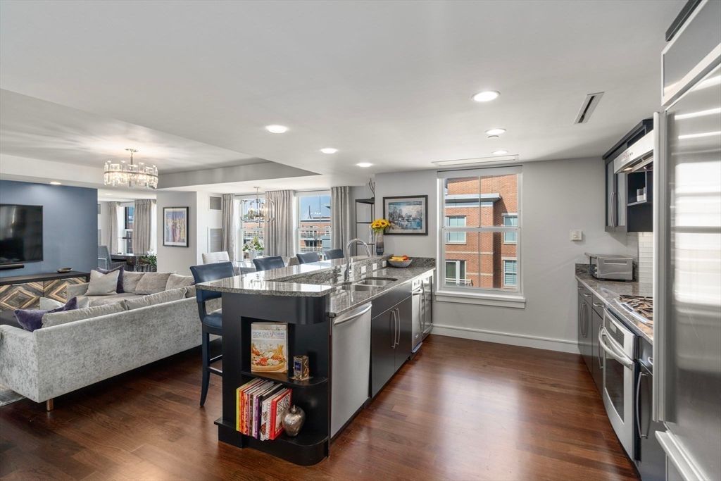 Chandelier, Dining room, Interior, Kitchen, Living room, Recessed Lighting, Stainless Steel Appliances, Wood Texture Flooring