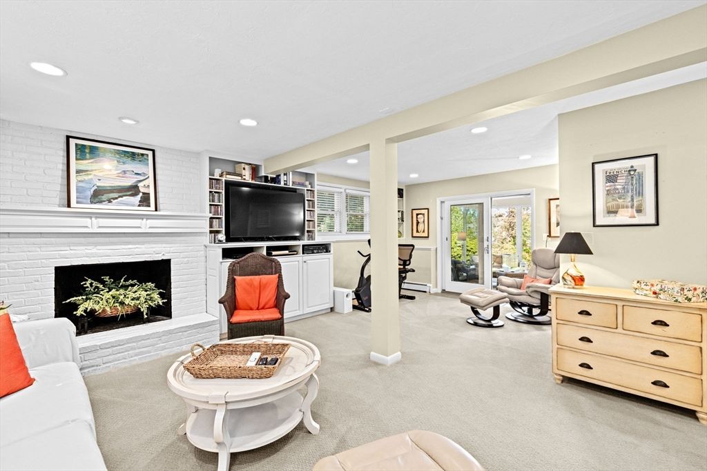 Fireplace, Fitness Equipment, Interior, Living room, Recessed Lighting, Stone Walls