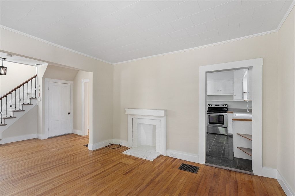 Fireplace, Interior, Kitchen, Stainless Steel Appliances, Wood Texture Flooring