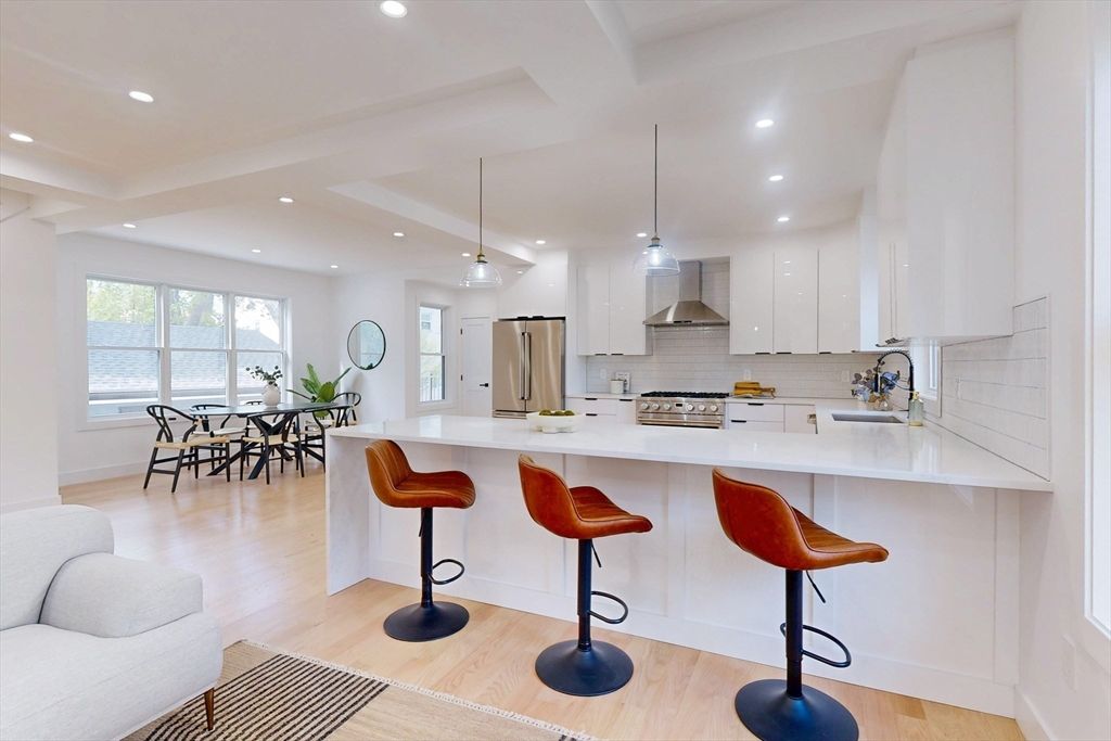 Dining room, Interior, Kitchen, Pendant Lights, Recessed Lighting, Stainless Steel Appliances, Wood Texture Flooring