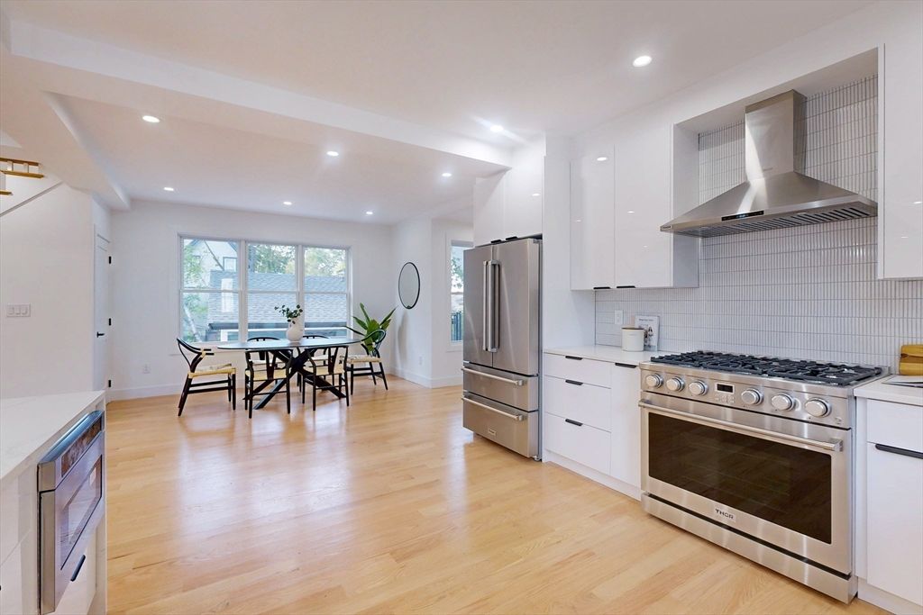 Dining room, Interior, Kitchen, Recessed Lighting, Stainless Steel Appliances, Wood Texture Flooring