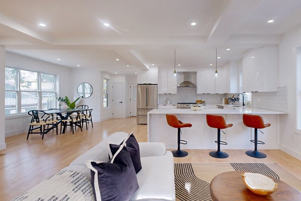 Dining room, Interior, Kitchen, Pendant Lights, Recessed Lighting, Stainless Steel Appliances, Wood Texture Flooring