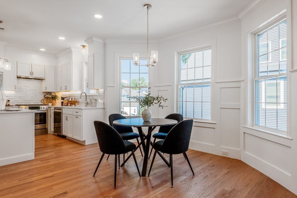 Dining room, Interior, Kitchen, Pendant Lights, Recessed Lighting, Stainless Steel Appliances, Wood Texture Flooring