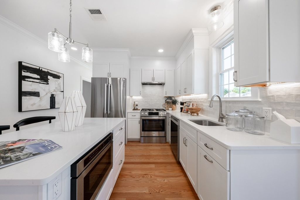 Interior, Kitchen, Pendant Lights, Recessed Lighting, Stainless Steel Appliances, Wood Texture Flooring