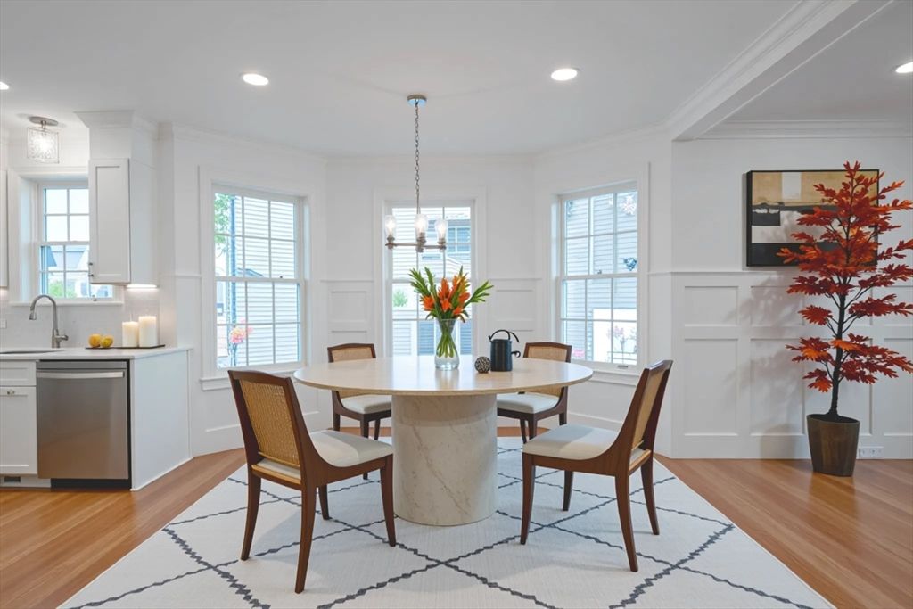 Dining room, Interior, Kitchen, Pendant Lights, Recessed Lighting, Stainless Steel Appliances, Wood Texture Flooring