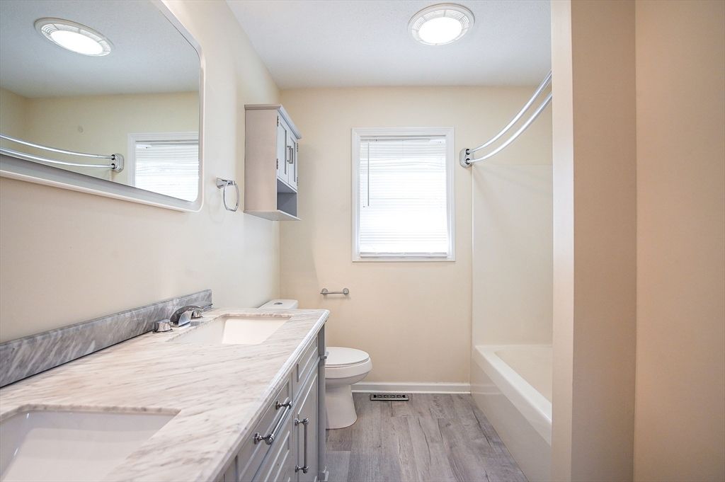 Bathroom, Dual Sink Vanities, Interior, Recessed Lighting, Wood Texture Flooring