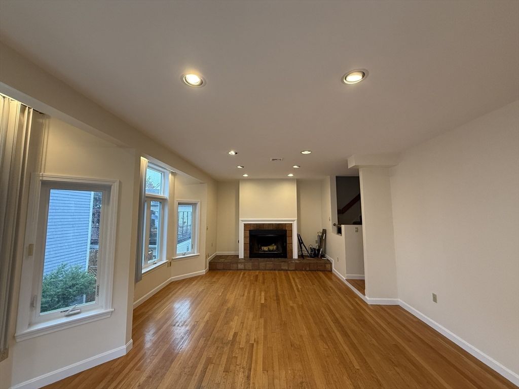 Empty room, Fireplace, Interior, Recessed Lighting, Wood Texture Flooring