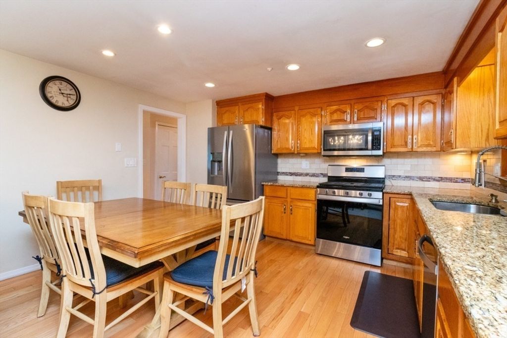 Dining room, Interior, Kitchen, Recessed Lighting, Stainless Steel Appliances, Wood Texture Flooring