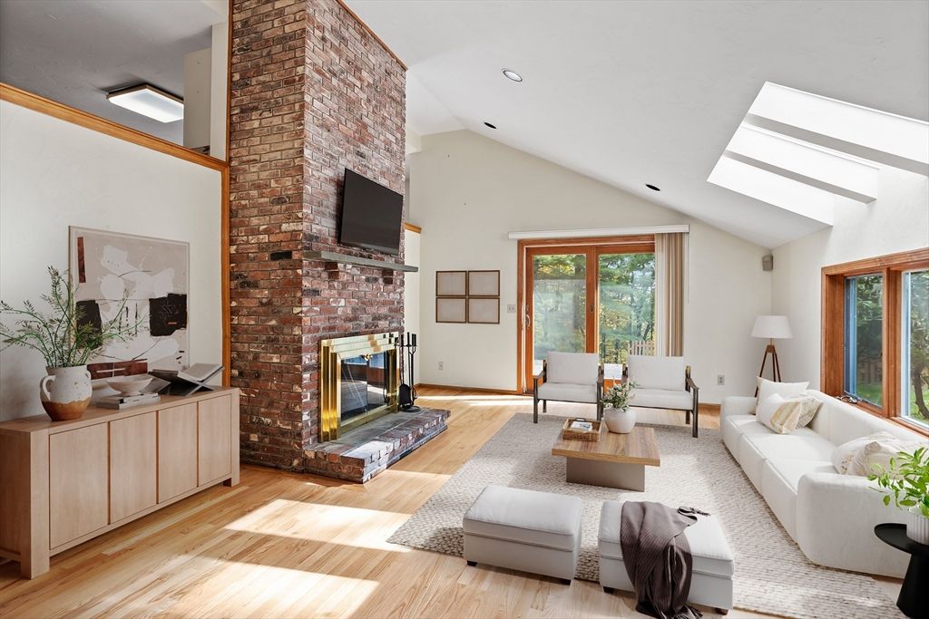 Fireplace, Interior, Living room, Recessed Lighting, Stone Walls, Wood Texture Flooring