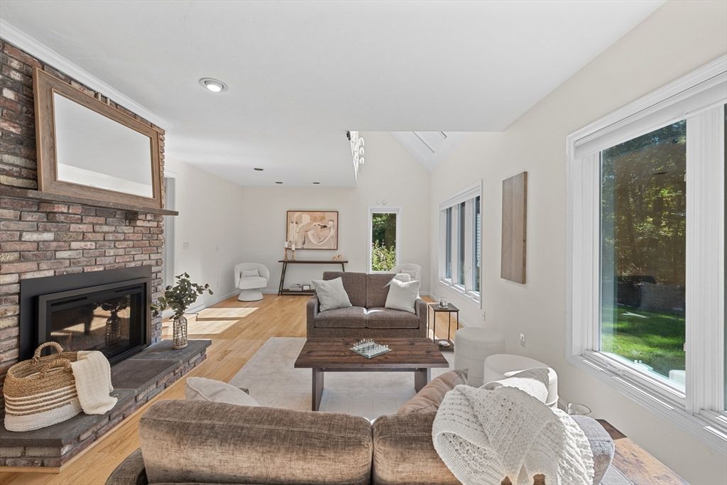 Fireplace, Interior, Living room, Recessed Lighting, Stone Walls, Wood Texture Flooring