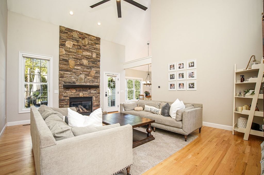 Fireplace, Interior, Living room, Pendant Lights, Recessed Lighting, Stone Walls, Wood Texture Flooring