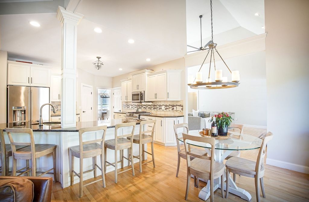 Chandelier, Dining room, Interior, Kitchen, Pendant Lights, Recessed Lighting, Stainless Steel Appliances, Wood Texture Flooring