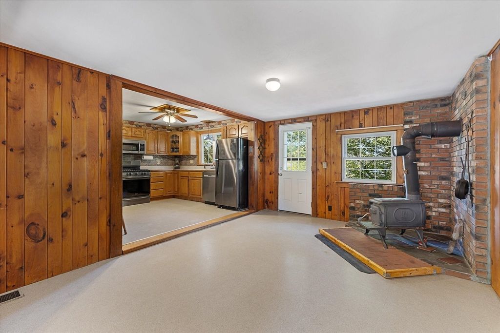 Fireplace, Interior, Kitchen, Stainless Steel Appliances, Stone Walls, Wooden Walls