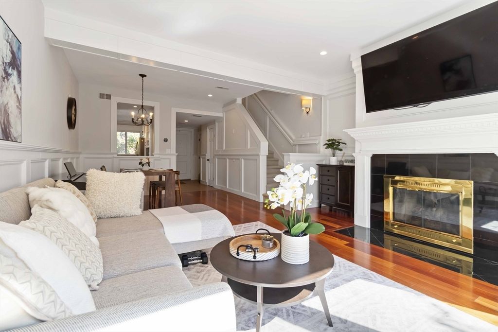Chandelier, Dining room, Fireplace, Interior, Living room, Recessed Lighting, Wood Texture Flooring