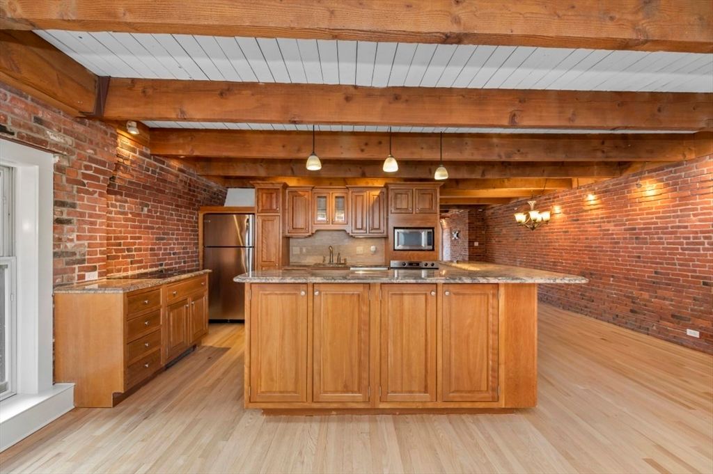 Interior, Kitchen, Pendant Lights, Stainless Steel Appliances, Stone Walls, Wooden Beams, Wood Texture Flooring