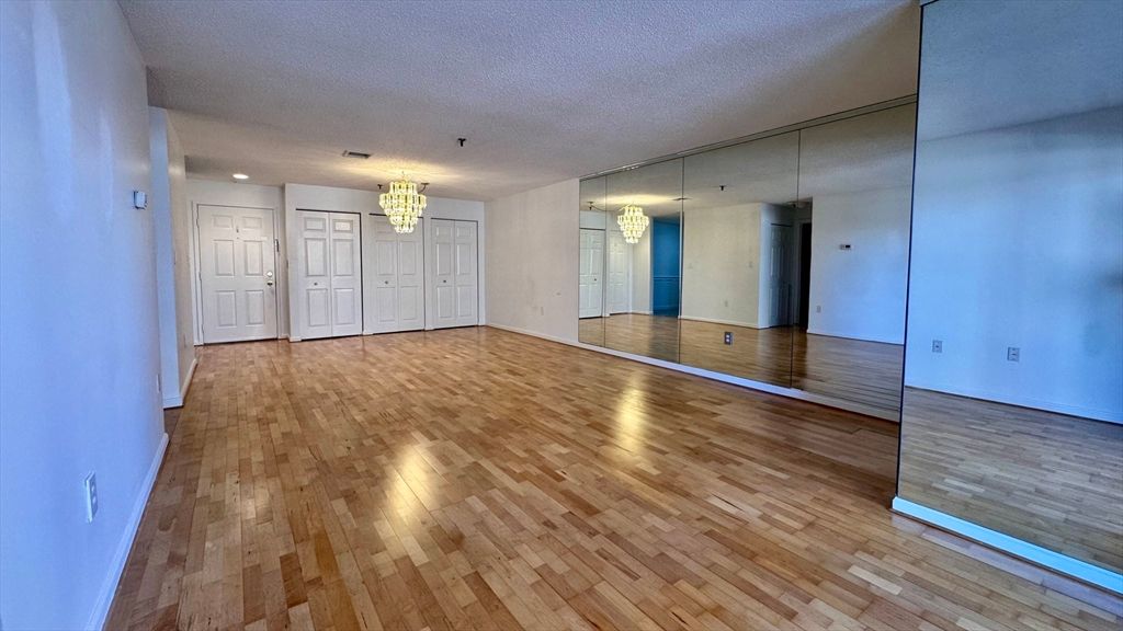 Chandelier, Empty room, Interior, Recessed Lighting, Wood Texture Flooring