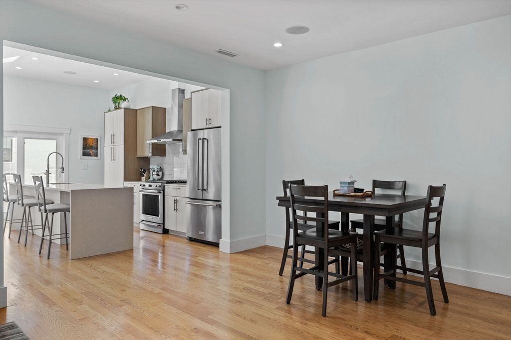 Dining room, Interior, Kitchen, Recessed Lighting, Stainless Steel Appliances, Wood Texture Flooring