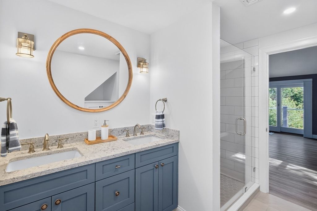 Bathroom, Dual Sink Vanities, Glass Shower, Interior, Recessed Lighting, Wood Texture Flooring