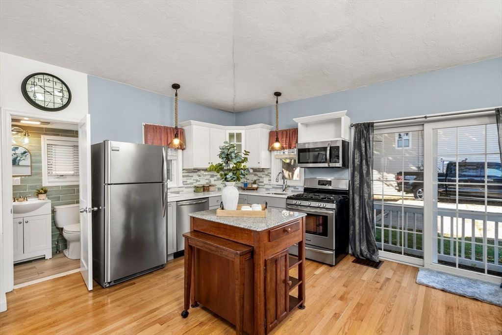 Interior, Kitchen, Pendant Lights, Stainless Steel Appliances, Wood Texture Flooring