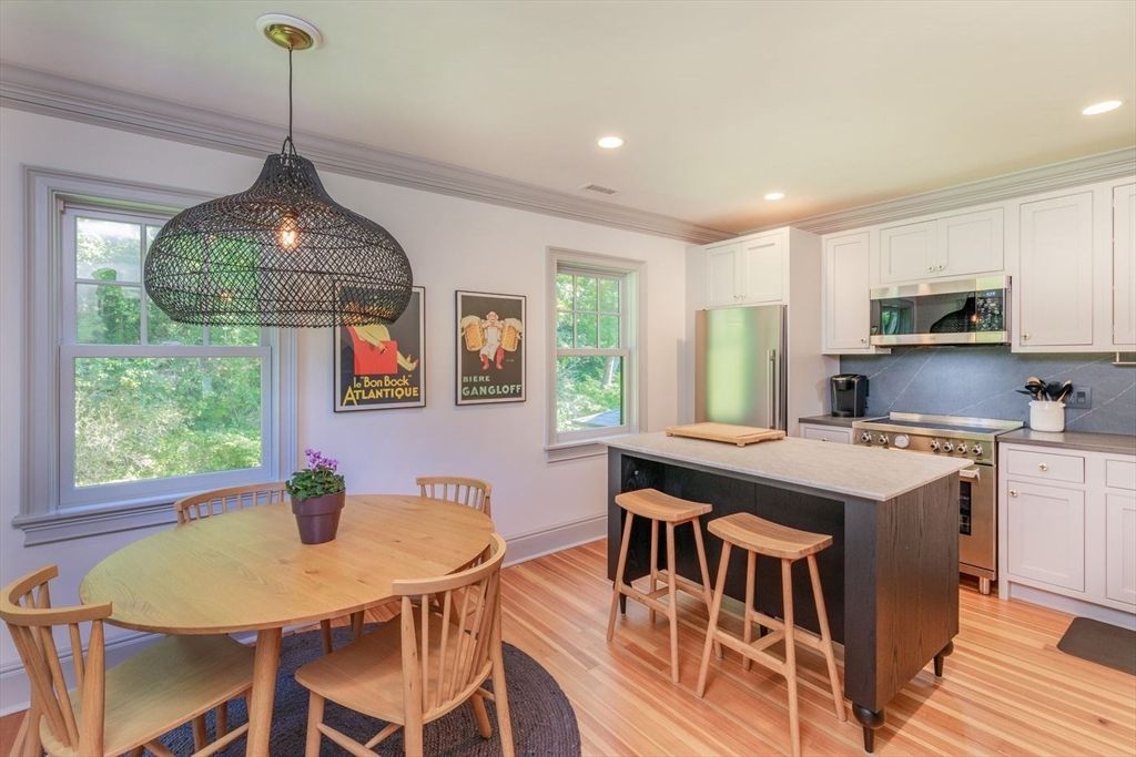 Dining room, Interior, Kitchen, Pendant Lights, Recessed Lighting, Stainless Steel Appliances, Wood Texture Flooring