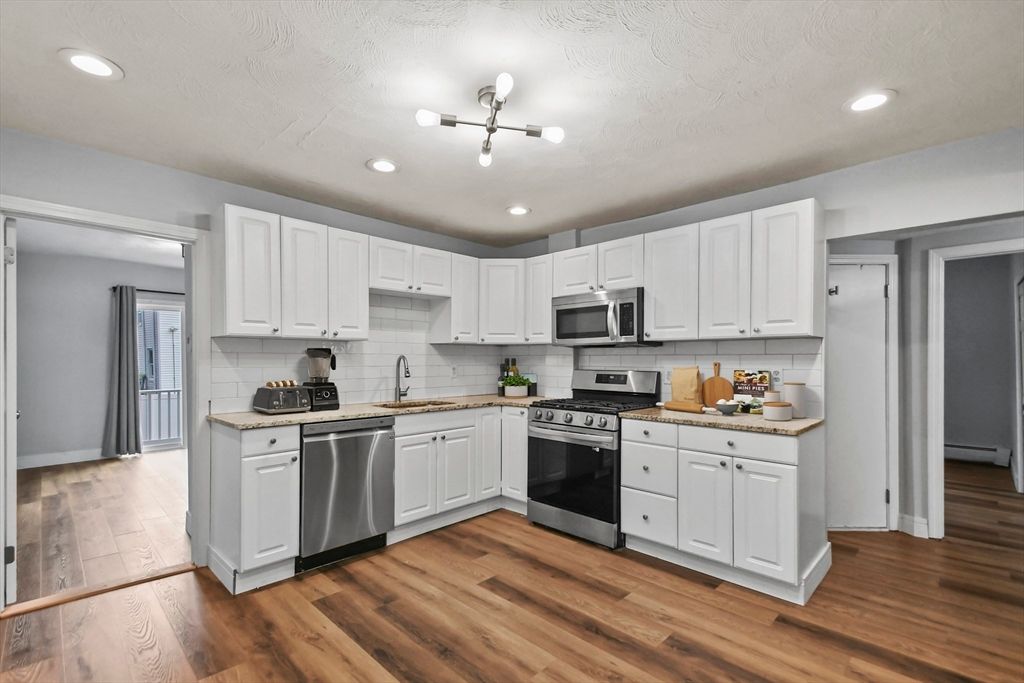 Interior, Kitchen, Recessed Lighting, Stainless Steel Appliances, Wood Texture Flooring