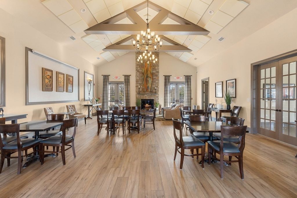 Dining room, Fireplace, Interior, Living room, Recessed Lighting, Wood Texture Flooring