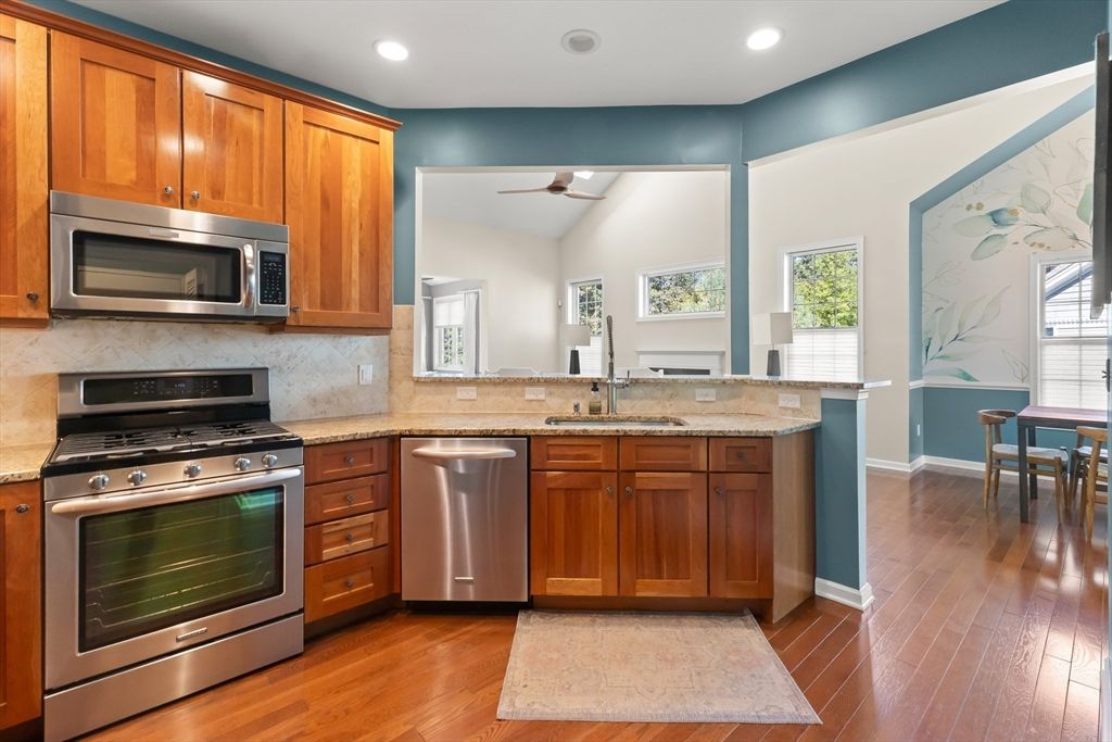 Dining room, Interior, Kitchen, Recessed Lighting, Stainless Steel Appliances, Wood Texture Flooring