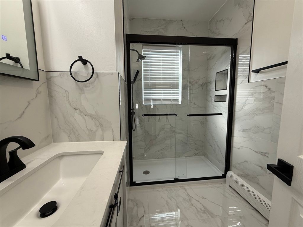 Bathroom, Dual Sink Vanities, Glass Shower, Interior, Marble, Marble Walls