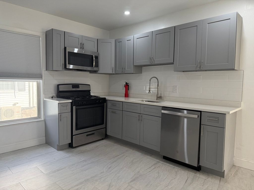 Interior, Kitchen, Marble, Recessed Lighting, Stainless Steel Appliances, Wood Texture Flooring