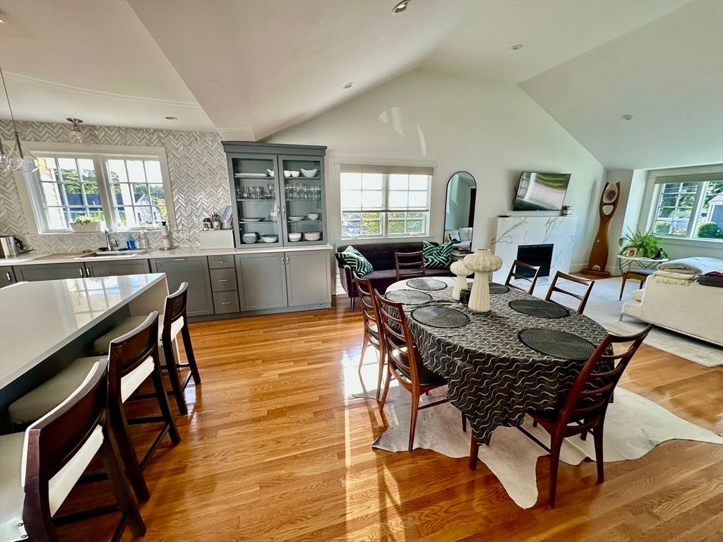 Dining room, Fireplace, Interior, Living room, Pendant Lights, Recessed Lighting, Wood Texture Flooring
