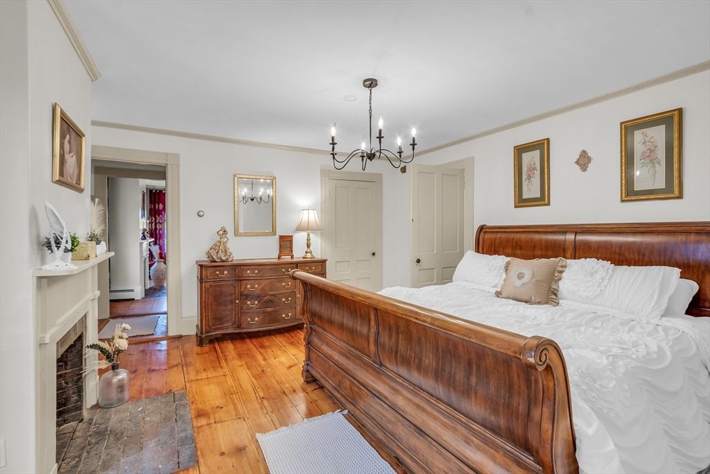 Bedroom, Chandelier, Fireplace, Interior, Wood Texture Flooring