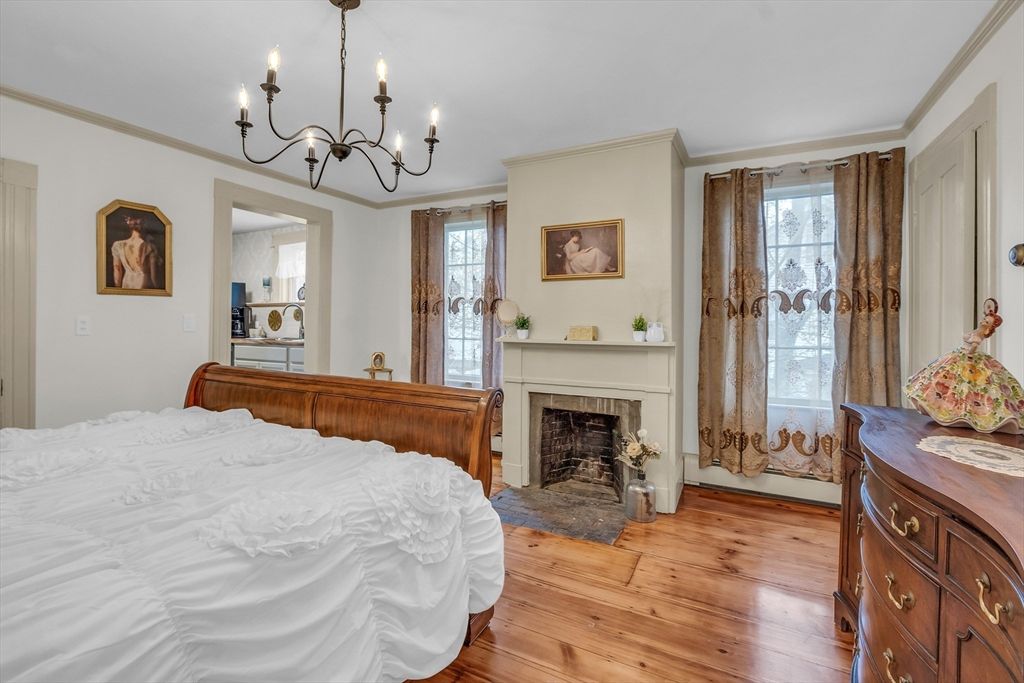 Bedroom, Chandelier, Fireplace, Interior, Wood Texture Flooring