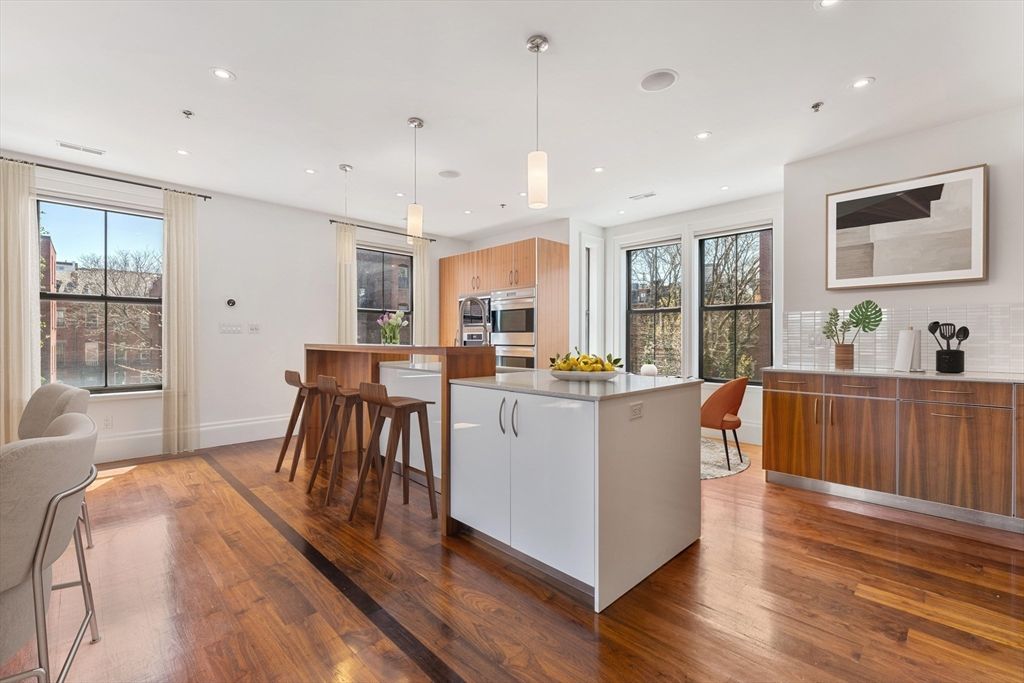 Dining room, Interior, Kitchen, Pendant Lights, Recessed Lighting, Stainless Steel Appliances, Wood Texture Flooring