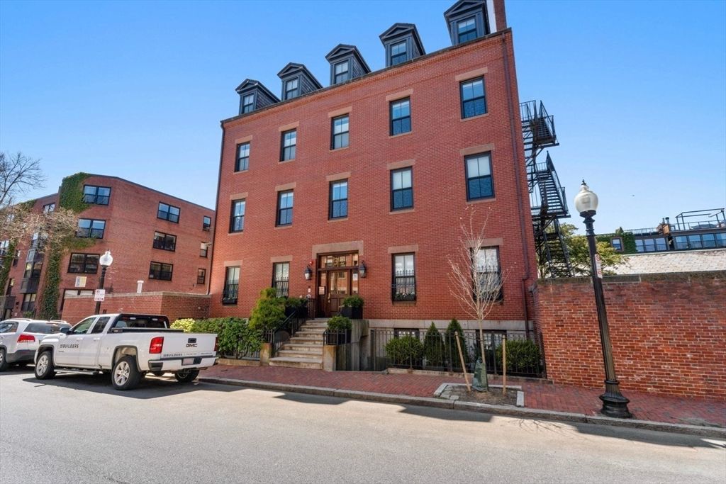 Exterior, Facade, Brick Facade, Condo Building