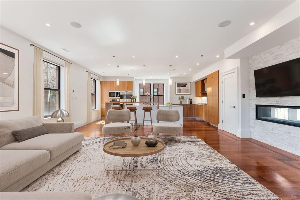 Fireplace, Interior, Kitchen, Living room, Pendant Lights, Recessed Lighting, Stainless Steel Appliances, Stone Walls, Wood Texture Flooring