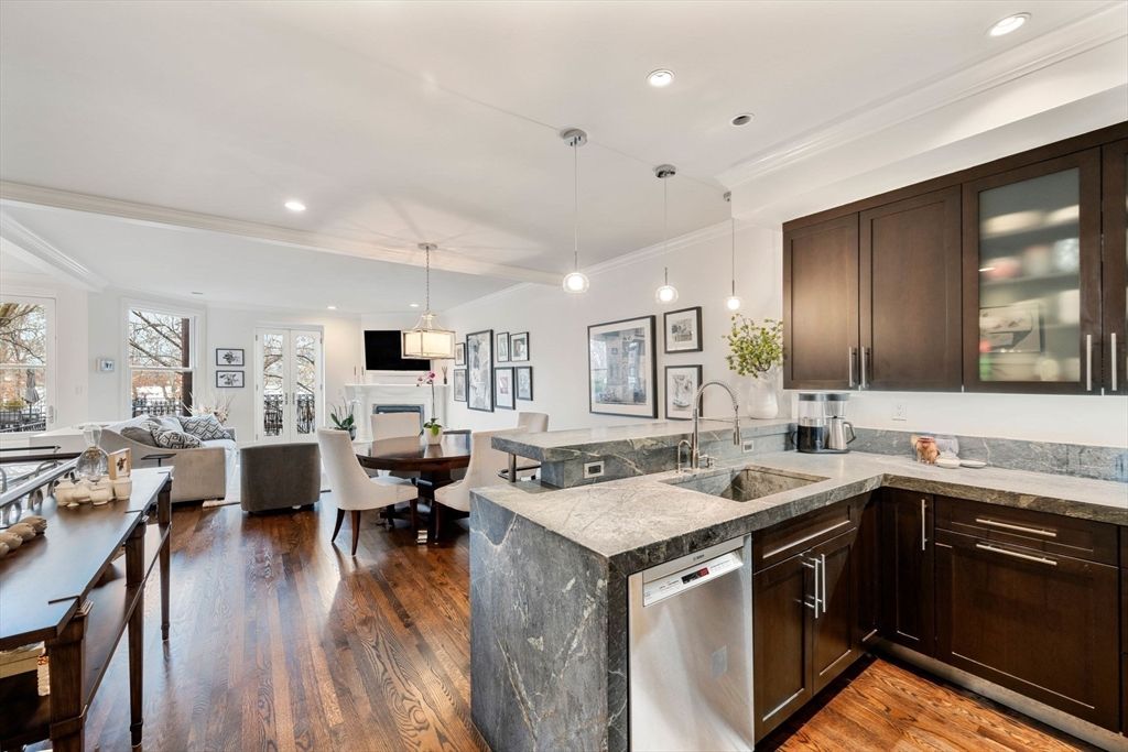 Dining room, Fireplace, Interior, Kitchen, Living room, Pendant Lights, Recessed Lighting, Stainless Steel Appliances, Wood Texture Flooring