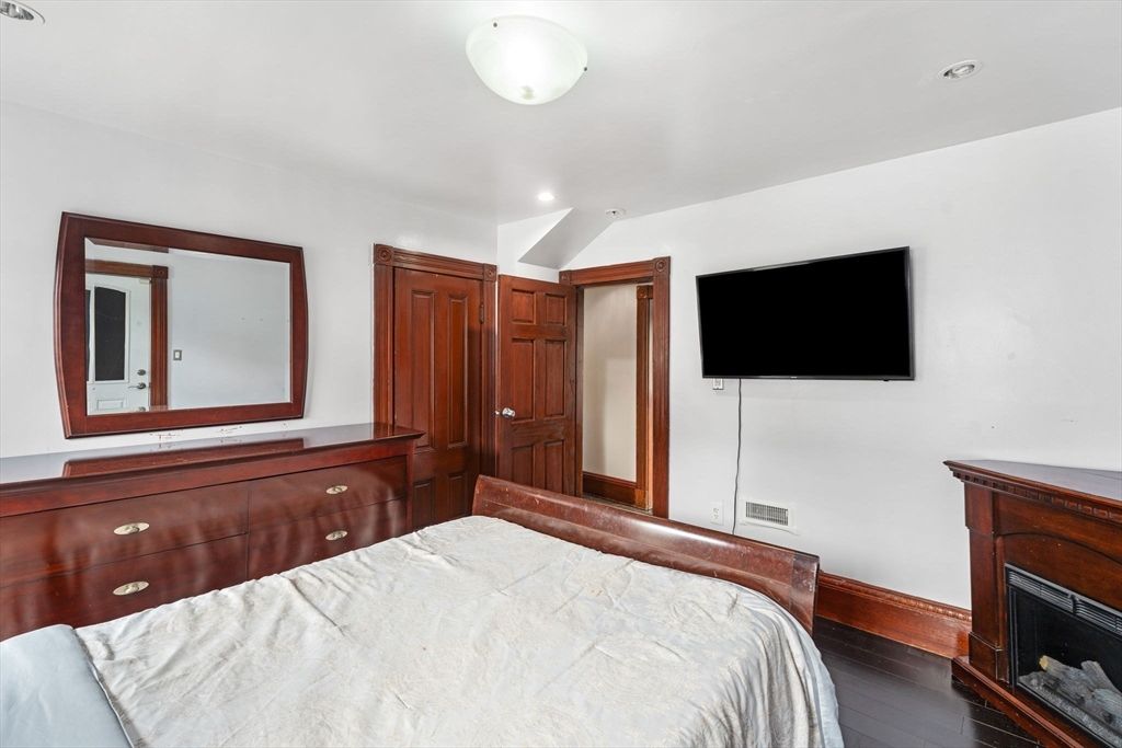 Bedroom, Fireplace, Interior, Recessed Lighting, Wood Texture Flooring