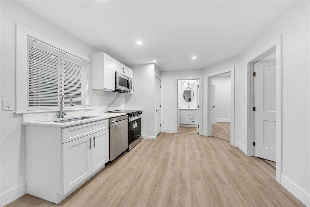 Interior, Kitchen, Recessed Lighting, Stainless Steel Appliances, Wood Texture Flooring