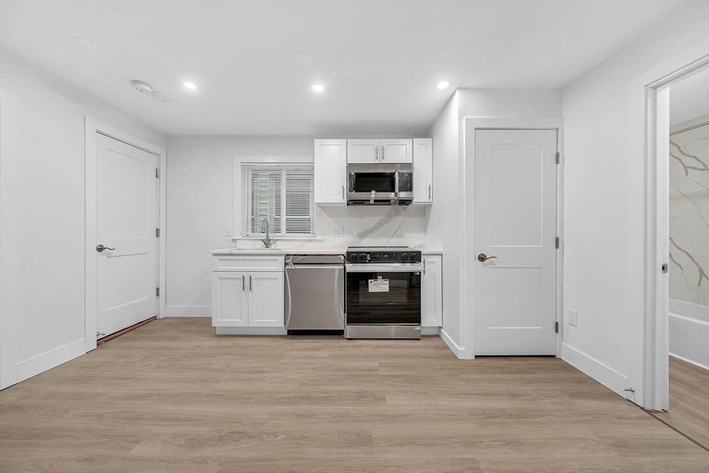Interior, Kitchen, Recessed Lighting, Stainless Steel Appliances, Wood Texture Flooring