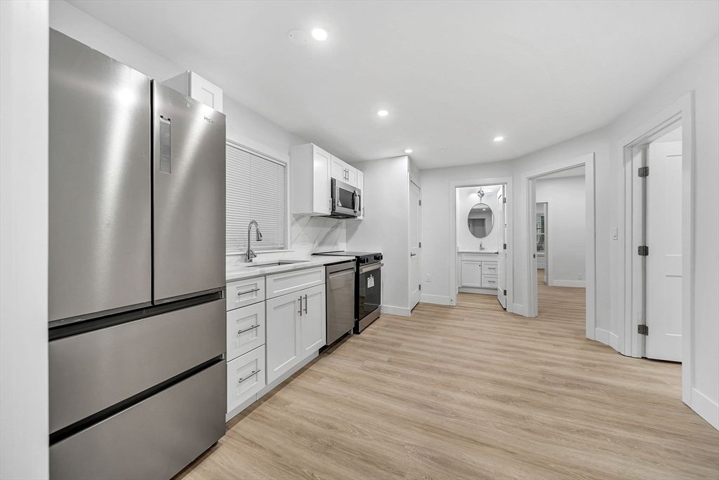 Interior, Kitchen, Recessed Lighting, Stainless Steel Appliances, Wood Texture Flooring