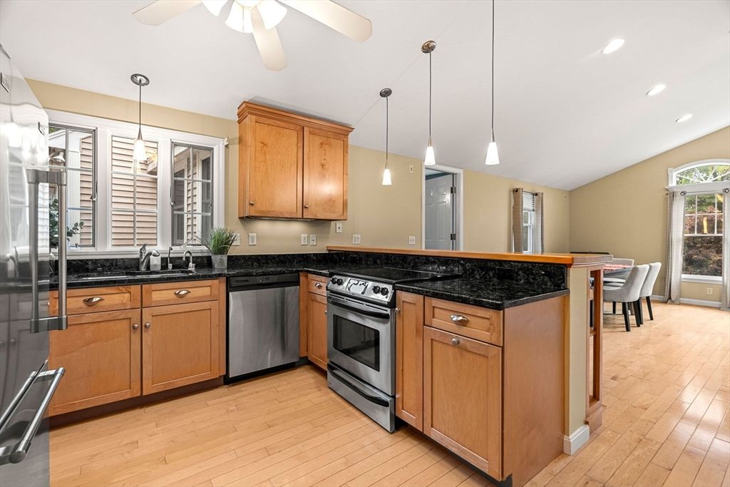 Dining room, Interior, Kitchen, Pendant Lights, Recessed Lighting, Stainless Steel Appliances, Wood Texture Flooring