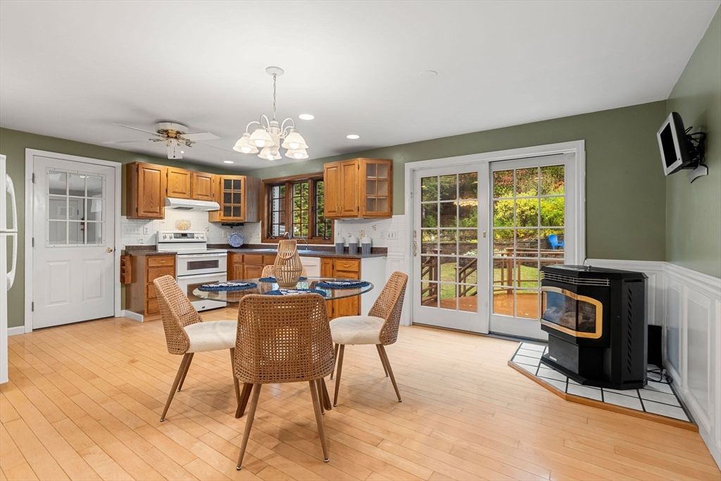 Dining room, Fireplace, Interior, Kitchen, Pendant Lights, Recessed Lighting, Wood Texture Flooring