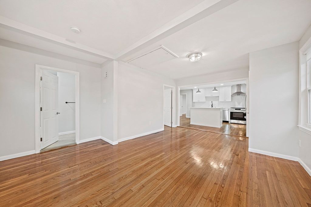 Empty room, Interior, Kitchen, Stainless Steel Appliances, Wood Texture Flooring