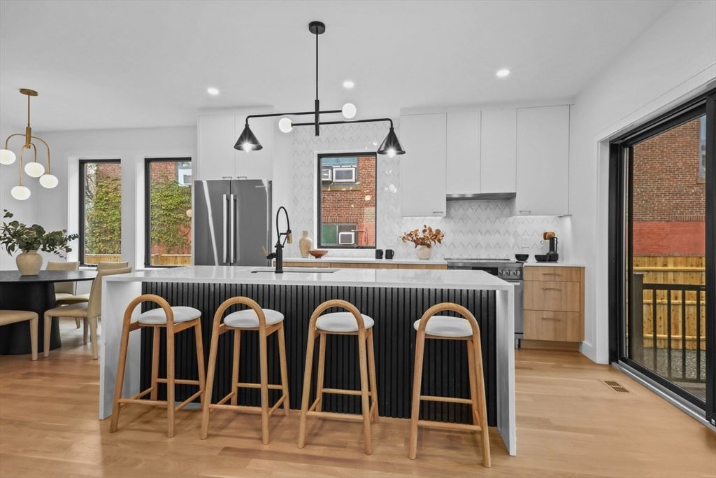 Dining room, Interior, Kitchen, Pendant Lights, Recessed Lighting, Stainless Steel Appliances, Wood Texture Flooring